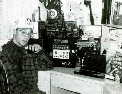 Pictured: Nerdy-ass, late-teenybopper me, in my old ham shack, circa 1993. The photo was featured in the July 1994 issue of Popular Communications magazine. Somehow, I still got lots of hot chicks. On the desk, is my old Tandy 3800HD laptop, running SLS Linux (and later Slackware Linux&hellip;fortunately).